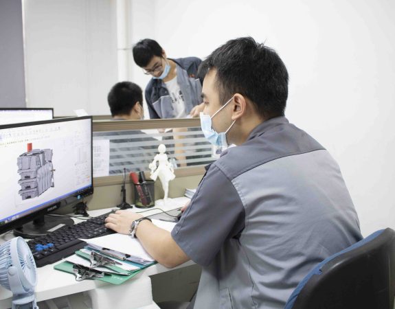 DFM Zone HLH Rapid engineer reviewing CAD drawing