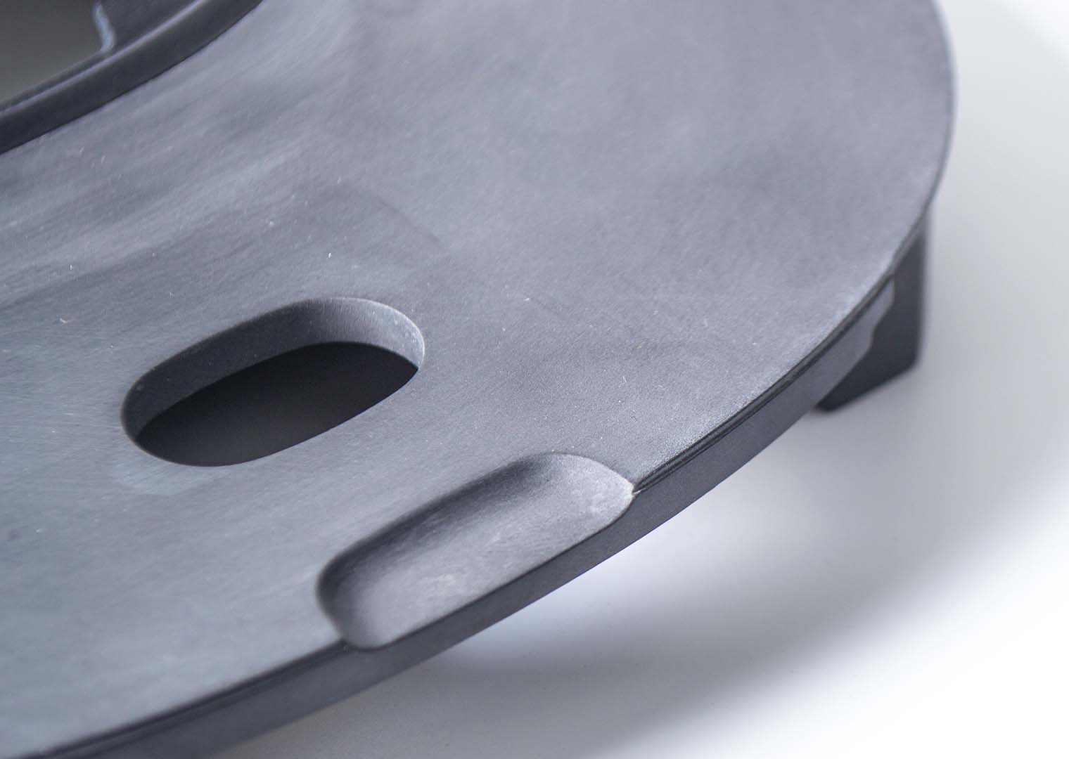 manual sanding a cnc machined pp material part using a sandgrit paper