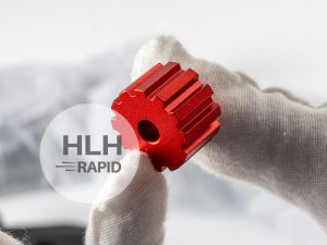CNC machined part with red anodised surface finish