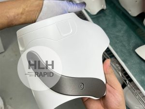 Vacuum cast part with spray painted surface finish