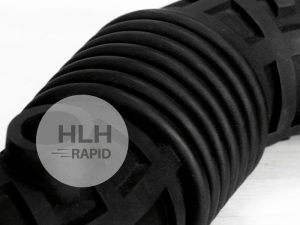 Vacuum cast part with injection-mould-like textured finish