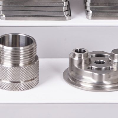 CNC machined metal part with high precision knurling and features